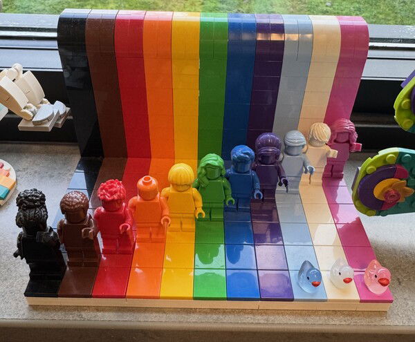 Rainbow Legos with all their ducks in a row.