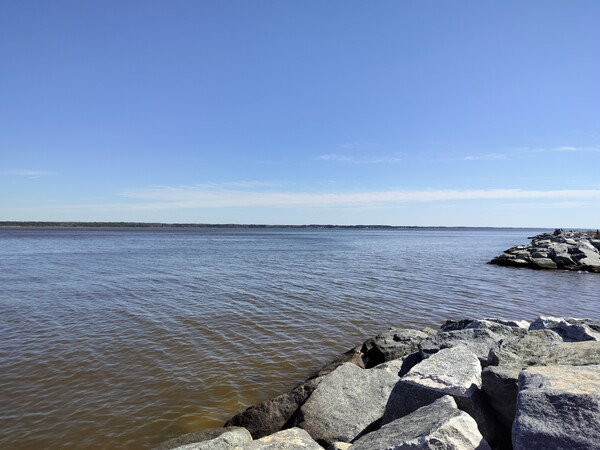 My view for lunch. The York river with rocks in the foreground.