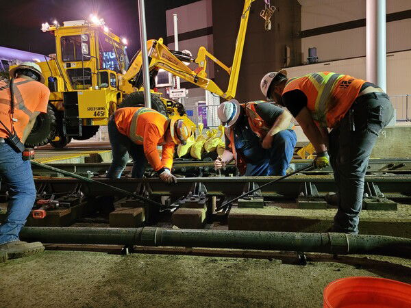 Working on the Light Rail near Target Field Station.