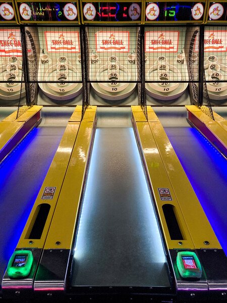 Snap #12: Rows of glowing skee-ball games at Dave & Busters.
