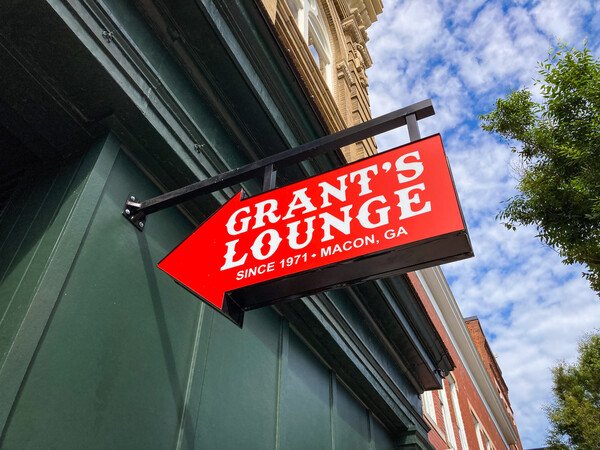 A bright red sign marks the entrance to Grant's Lounge, a staple on the Southern Rock music scene for nearly five decades.