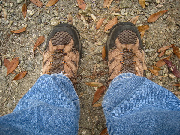 Looking down at my hiking boots before heading off on the trail.