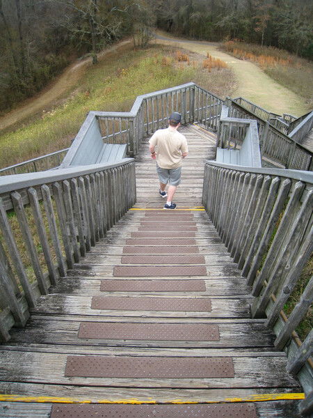 Making our way down a long flight of wooden stairs from the top of The Great Mound at Ocmulgee Mounds National Historical Park.