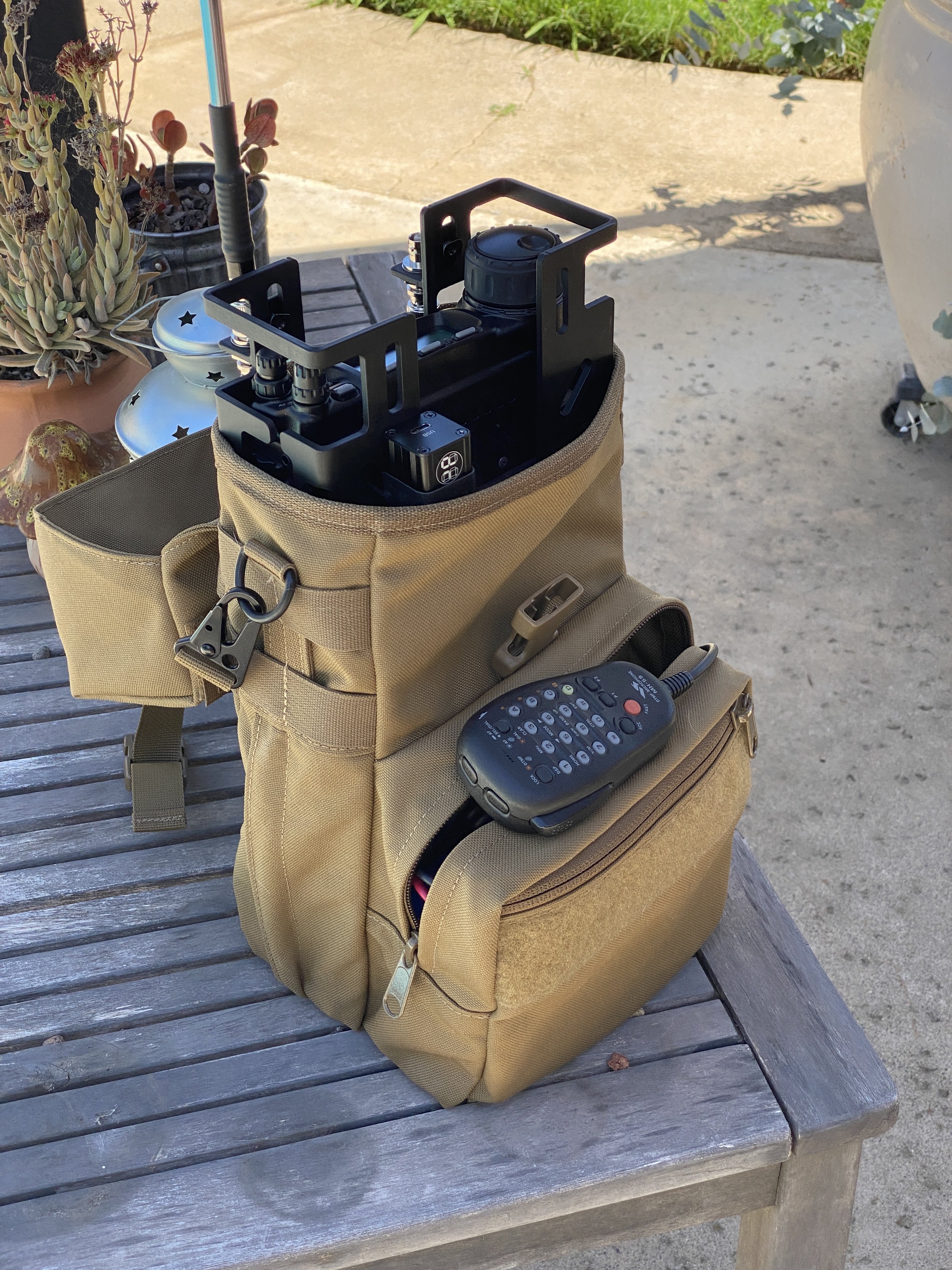 Portable pack with an all-mode ham radio capable of VHF, UHF, and HF frequencies inside a convenient grab-n-go bag and enough battery power to last most of a day