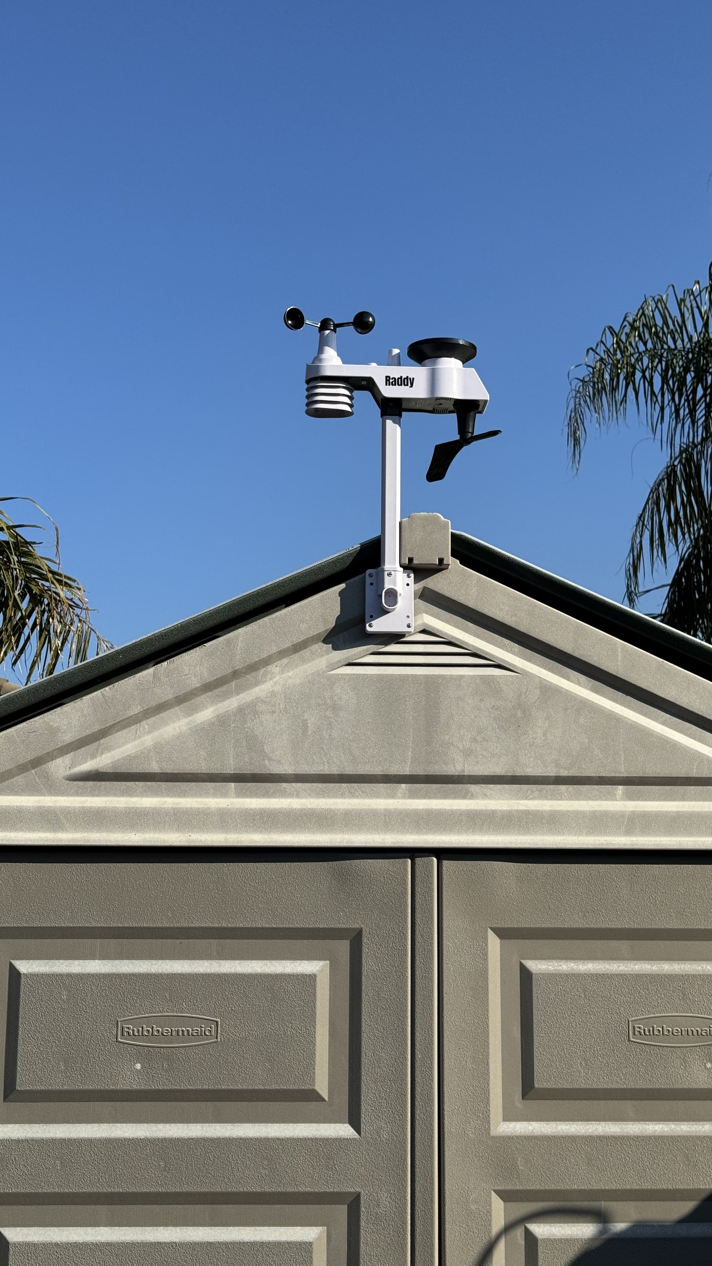 Raddy sensor array weather vane atop the backyard shed roof