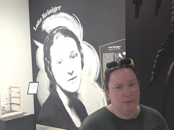 When you accidentally match the pose on the museum wall behind you. 