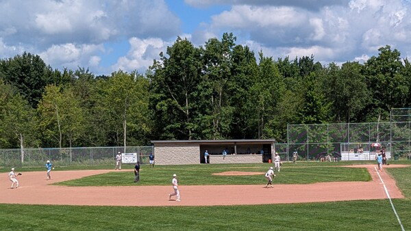 D throws him out at first in Muskegon. 