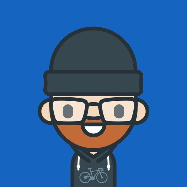 Profile picture in the unmistakable style of Andy Carolan. Me with a cap, glasses and a hoodie with a racing bike on it.