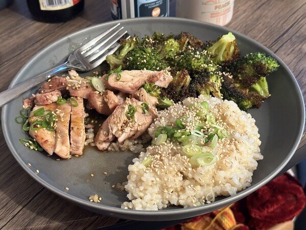 Grilled chicken, roasted broccoli, rice.