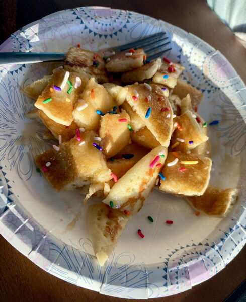 Birthday girl weekend request

Golden fried dough pieces with colorful sprinkles on a white paper plate with a blue and pink pattern.