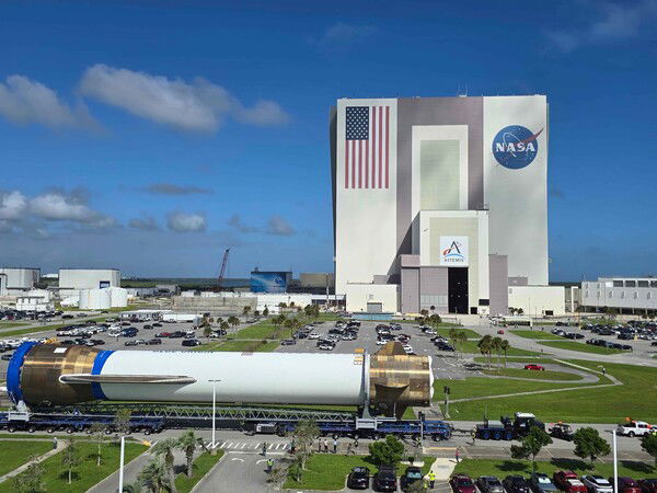 Blue Origin's Glenn Stage 1 (GS1) being transported from the Manufacturing Complex (MC), out to the Integration Facility (IF) at Launch Complex 36 (where my daughter works). They'll be mating it with the second stage & payload and roll it out to the launchpad for a hot fire test of the engines sometime soon.

While it would be an amazing shot of just the rocket itself, it's even more so that this was taken as it rolled by NASA's iconic Vehicle Assembly Building (VAB), which was completed in 1966 and supported the Apollo Saturn V & the Space Shuttle programs. Taken by a friend of one of my daughter's coworkers who works for NASA. Just so freakin cool!