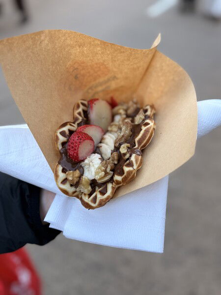 This is a treat called the “Naughty Boy” from the folks at the Naughty Waffle.

A heavenly combination of a warm waffle, Nutella spread, fresh strawberries, sliced banana and walnuts. They served it folded in half like a taco. 

#Foodie #Photography 