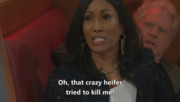 A scene from Beyond the Gates. Leslie Thomas says 'Oh, that crazy heifer tried to kill me!'