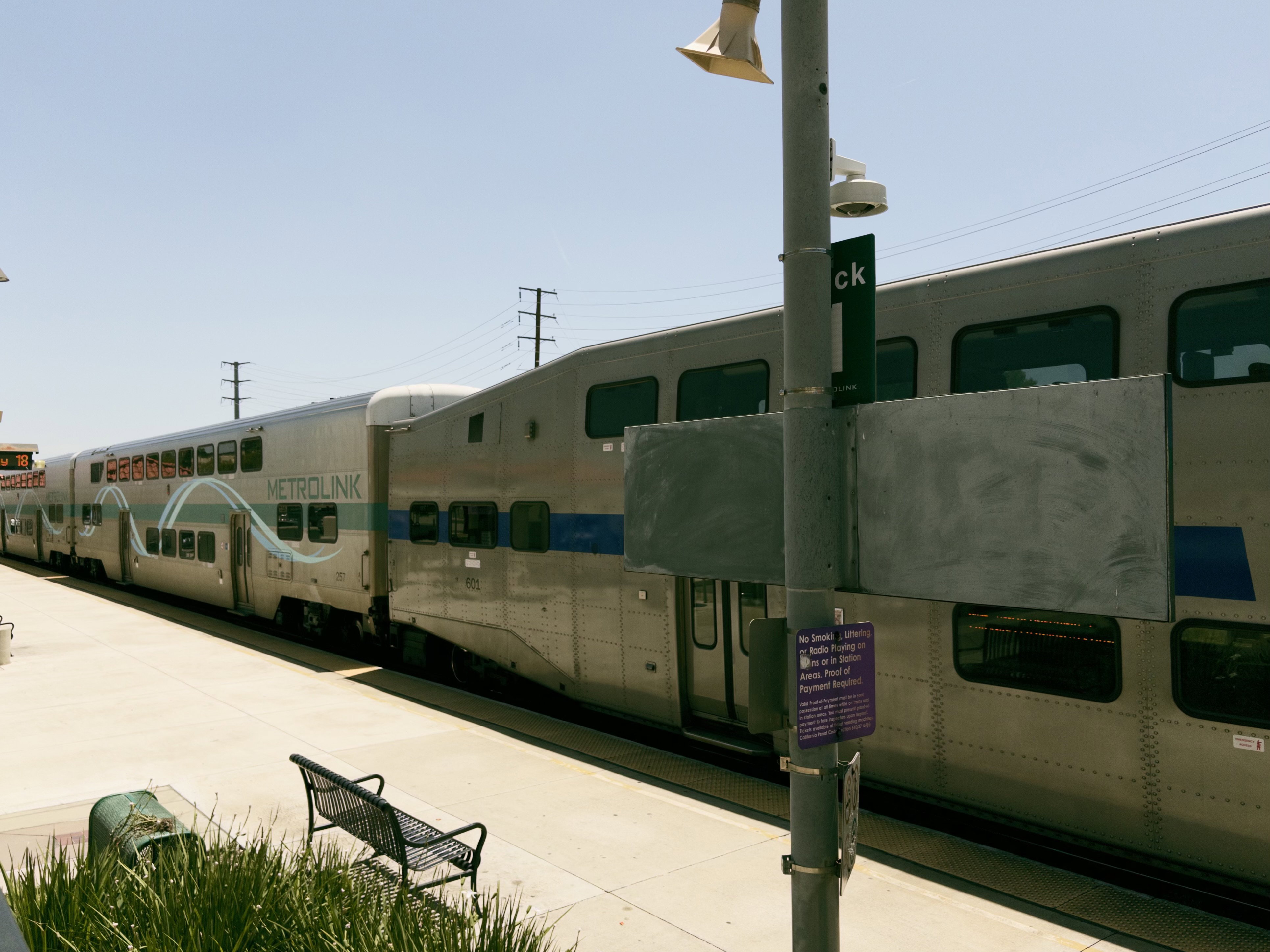 A commuter Metrolink train at a local station.