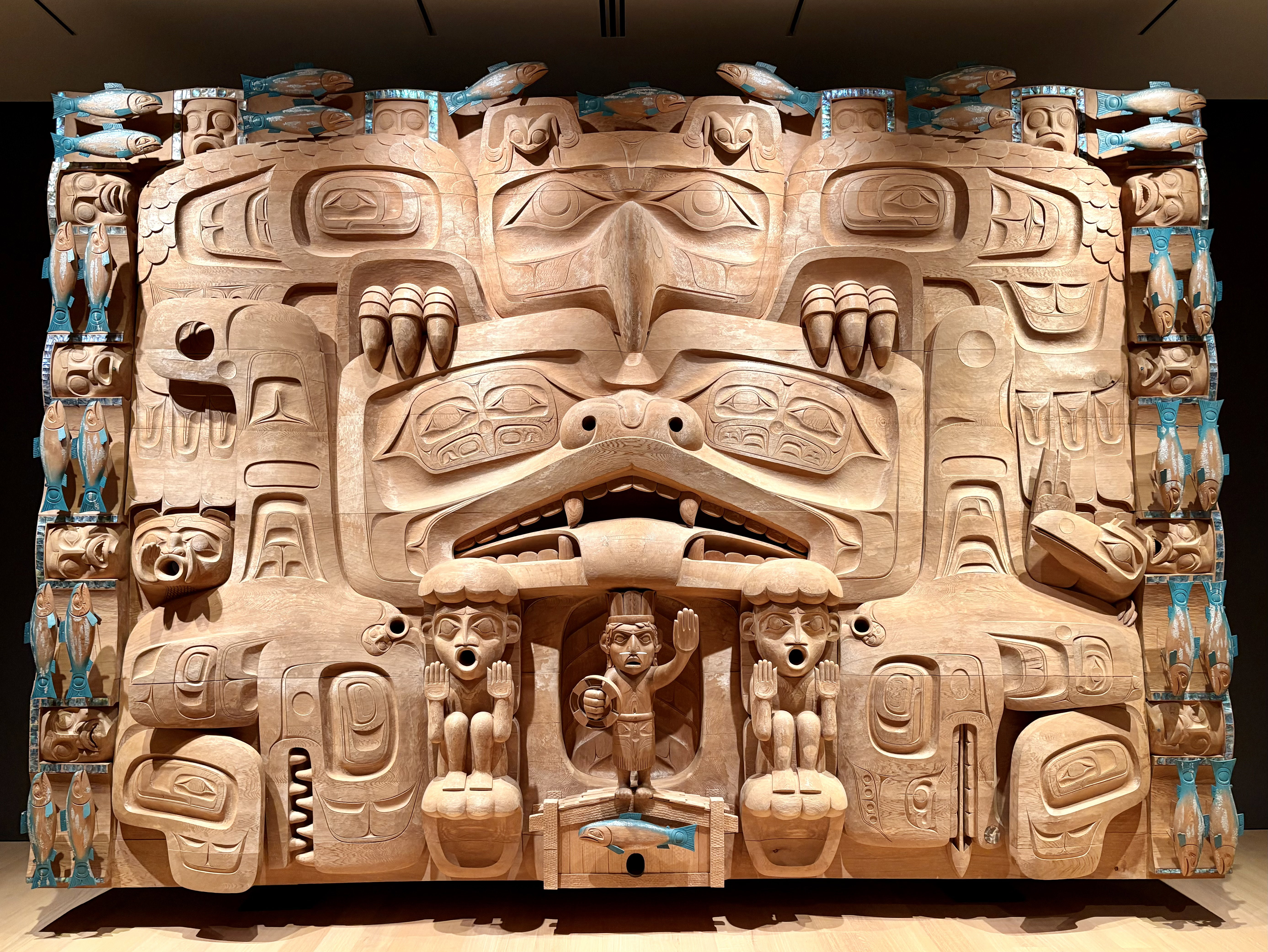 A massive wall-sized wood carving.