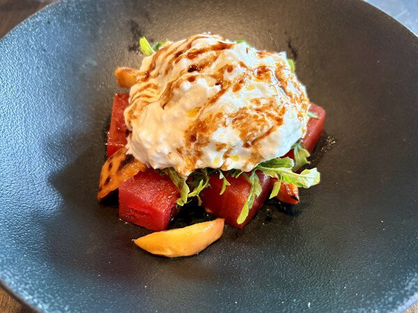 Compressed watermelon, peach, and burrata salad.