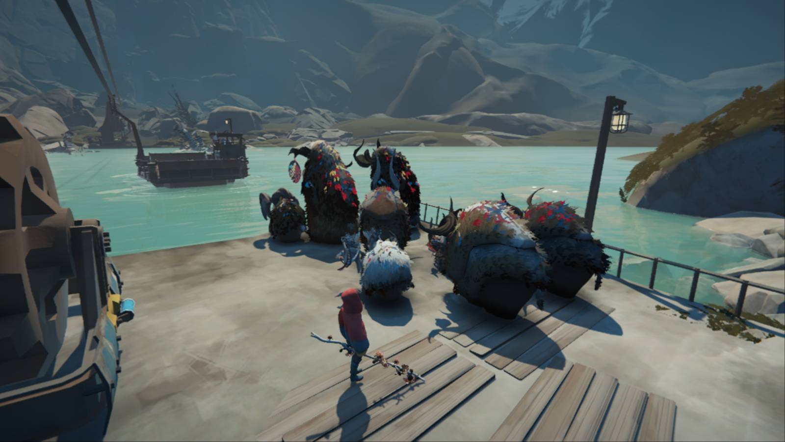 A herd of Calicorns from the game Herdling are waiting by the side of a river for a way to cross it in the next obstacle to be negotiated in the game. There are 8 Calicorns, the fantasy animal in the game, of different sizes and colours. The river is wide and there are hills beyond.
