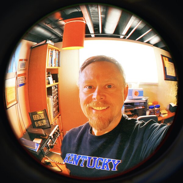 My first #Hipstamatic pic is a fisheye selfie.