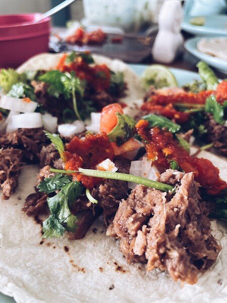 A picture of barbacoa tacos with hot salsa.

These are a typical dish in the north of Mexico, specifically in the state of Chihuahua, Mexico.