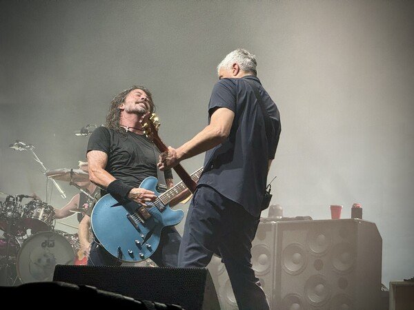 Dave Grohl and Pat Smear of the Foo Fighters playing on stage in Dallas, Texas on May 1, 2024. 
