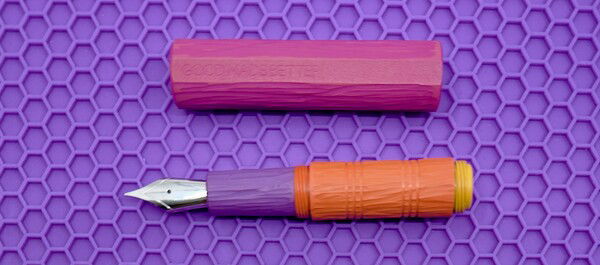 Good Made Better Jester in Ebonite, Sunrise Colorway, Bark finish.