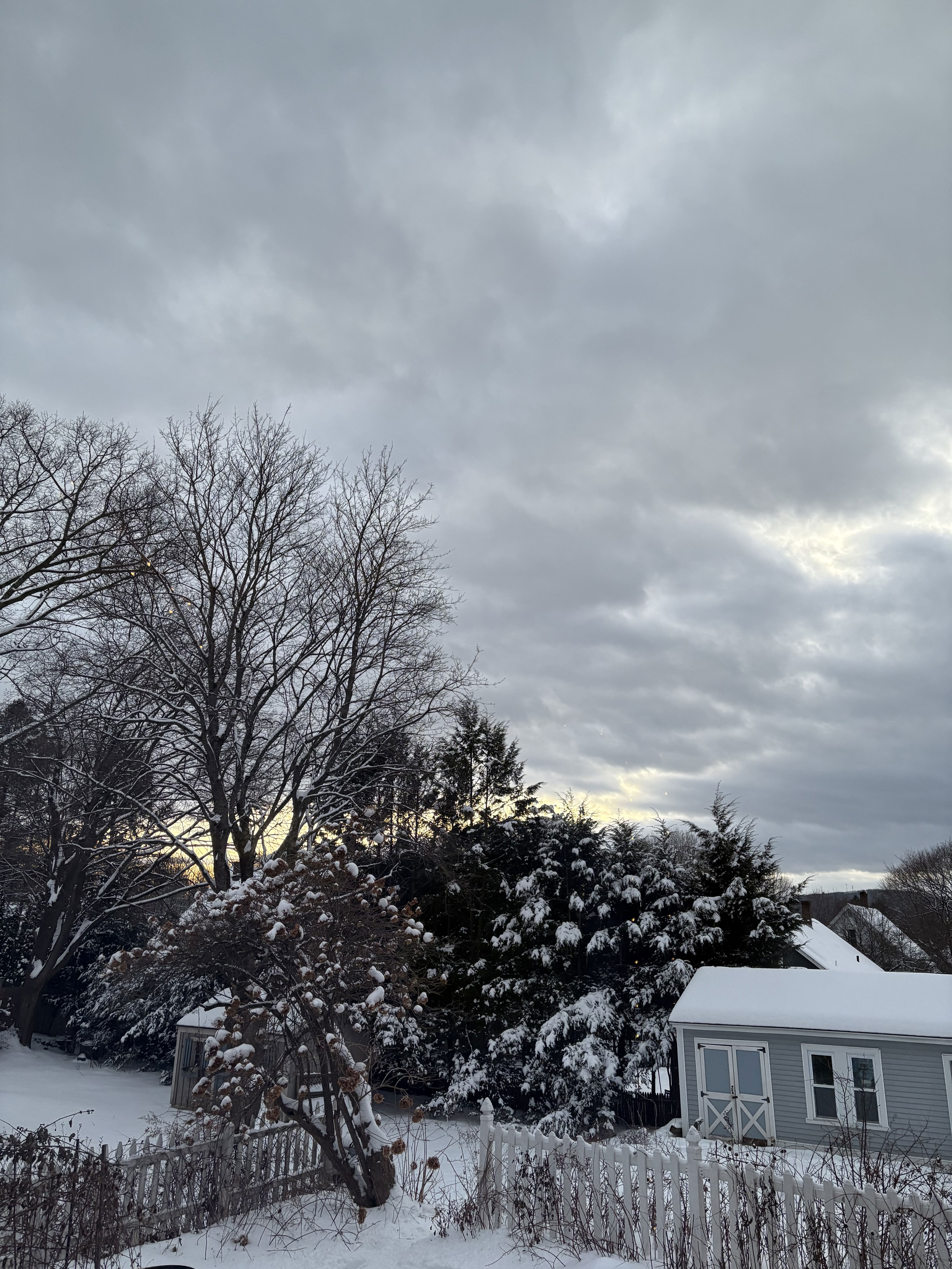 Clouds and snow at sunset