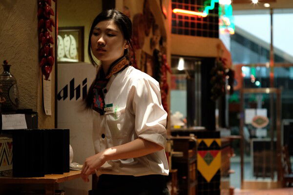 Service worker in her uniform at El Torito in Shinjuku Tokyo. Photo taken Tuesday, June 13, 2017. 