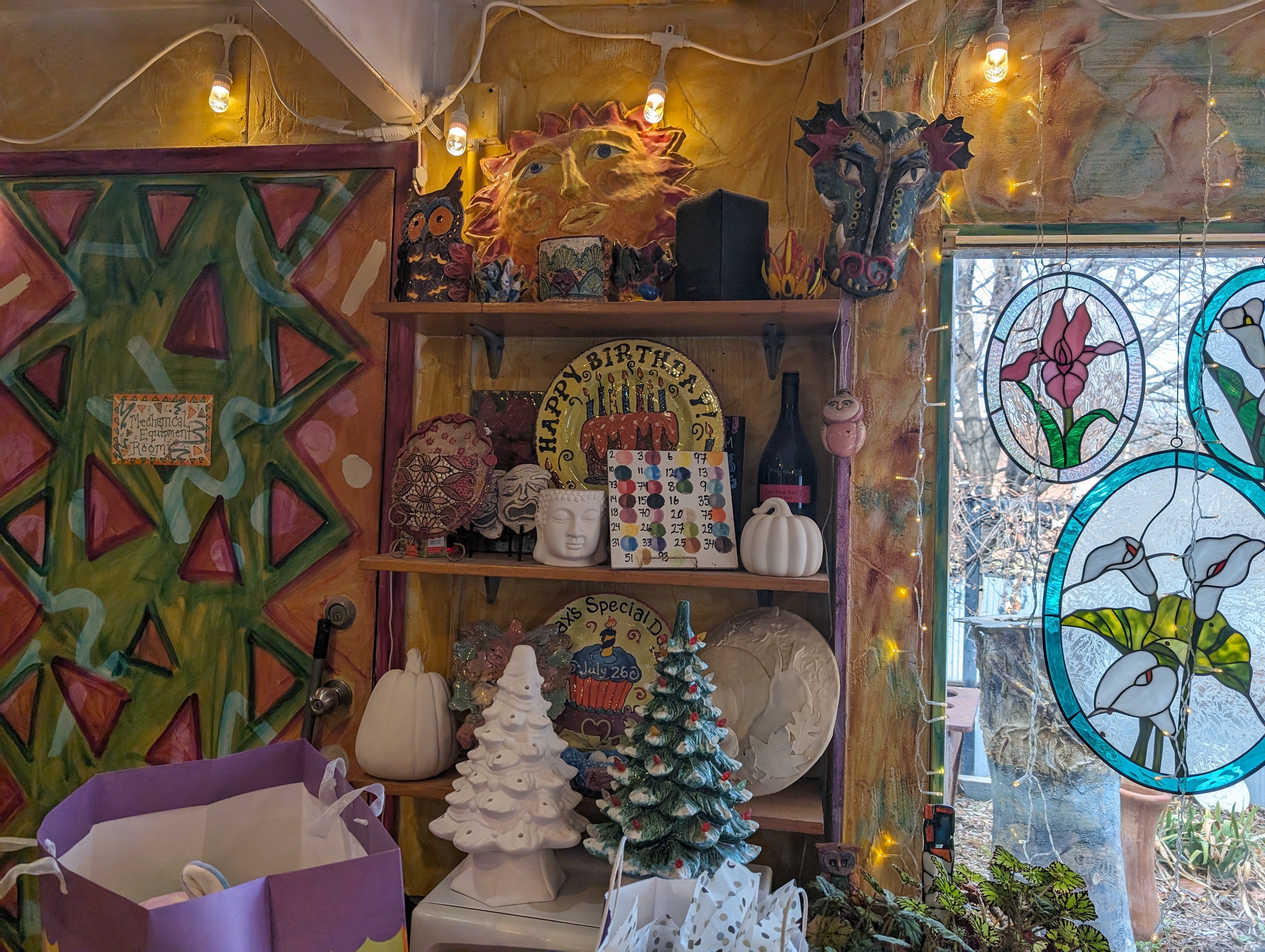 Photo of interior of Sunflower Ceramics, a local spot where people are able to paint and kiln fire some very cool statues.