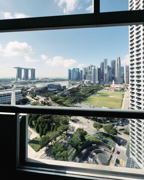 View of the Singapore city skyline from the balcony of the 25th floor of the Fairmont hotel.
