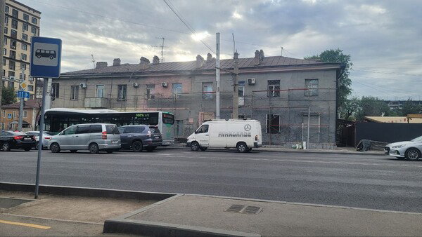 building being repainted into a sad, dull color?