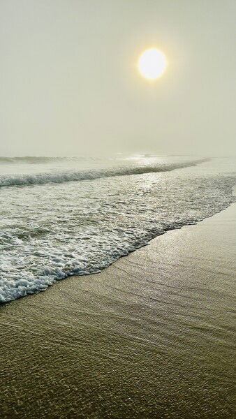 A foggy day at West End Beach on Dauphin Island, AL