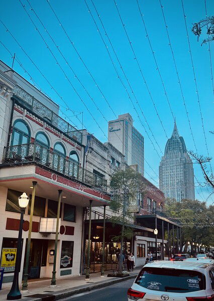Walking along Dauphin St in Downtown Mobile, Alabama