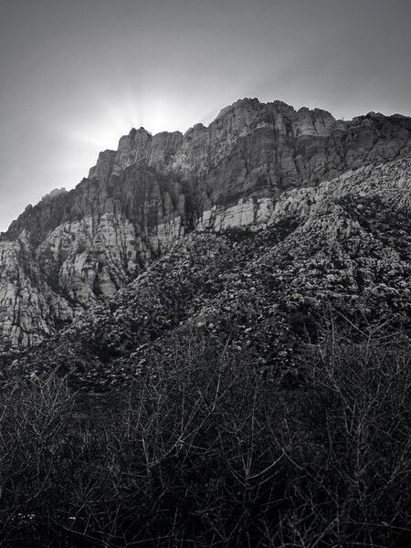 Sun slipping away behind the mountains