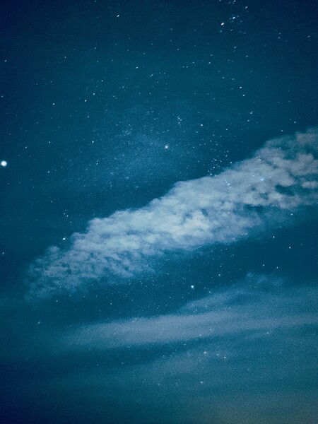 A sky full of stars. That prominent bright spot to the left is Jupiter. 