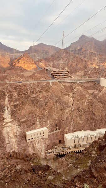 The sun hitting spots by the dam