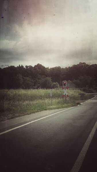 Along the quiet roads.